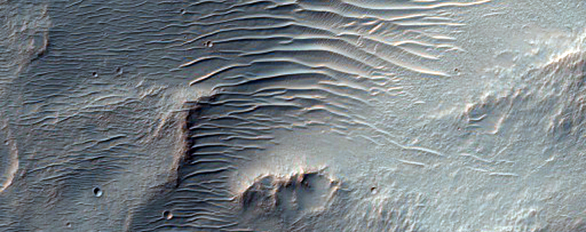 Bedrock Exposed by Crater and Erosion