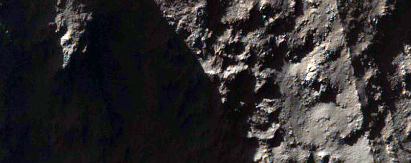 Light-Toned Patches on Mountain in CTX Image 