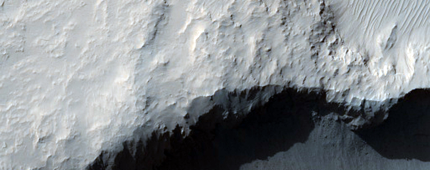 Inverted Channel and Fan Draining into Crater