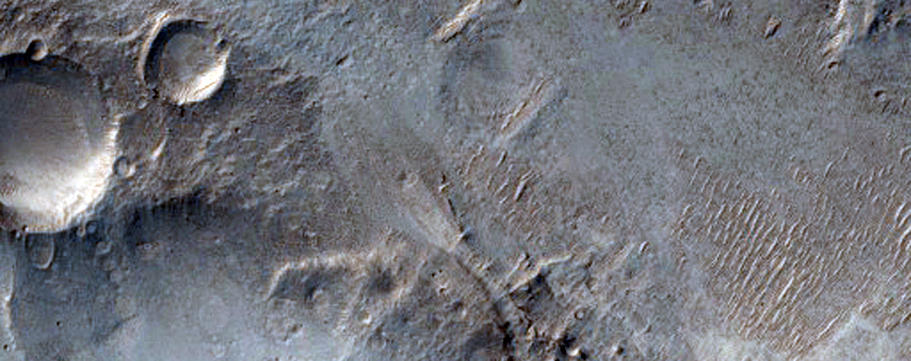 Short Valley and Lobate Forms at Terminus in the Libya Montes
