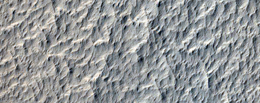 Crater with Yardangs and Interior Mound in Arabia Terra