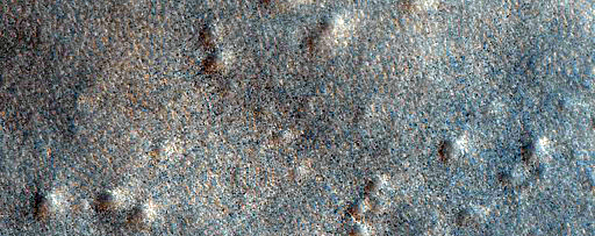 Secondary Impacts Near Domoni Crater
