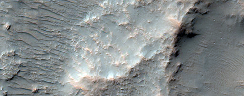 Channels and Ridges with Light-Toned Exposures South of Saheki Crater