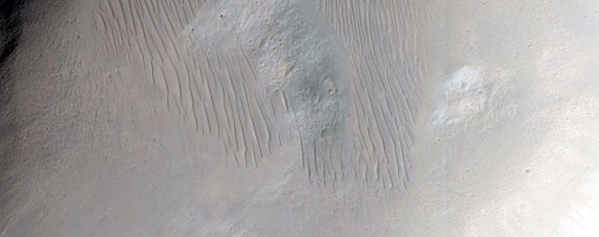Bedrock Exposed by 2-Kilometer Crater