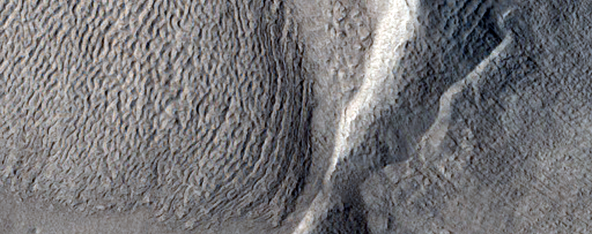 Crater on Wall in Mamers Valles