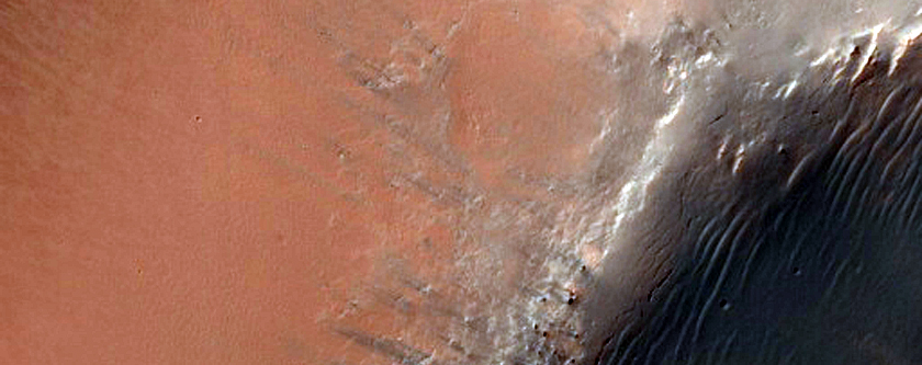 Layers on Floor of Small Crater in Noachis Terra