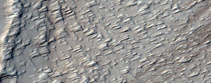 Fractures or Pits in Ceraunius Fossae Region
