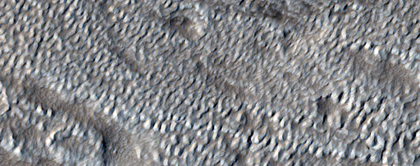 Features on Crater Floor South of Moreux Crater