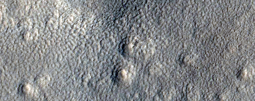 Expanded Craters on Northern Plains