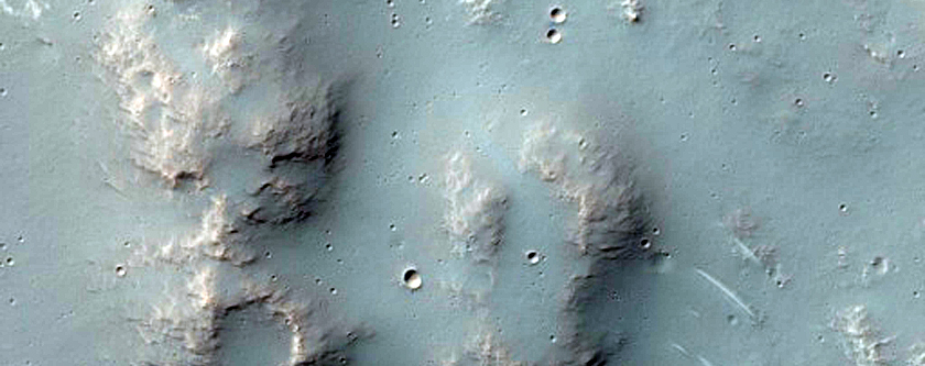 Mounds on Floor of Crater in Ausonia Montes