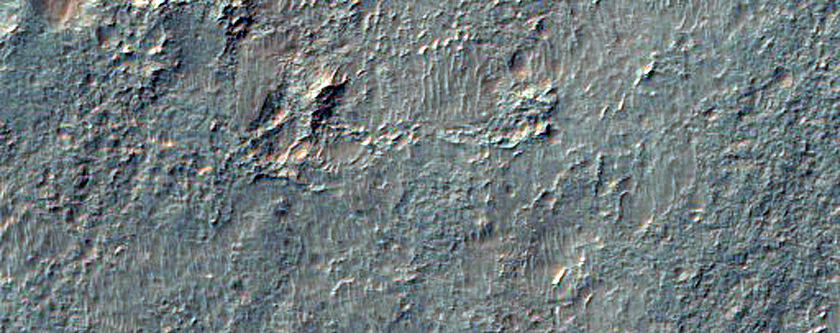 Light-Toned Layered Deposits Exposed in Ladon Valles Basin