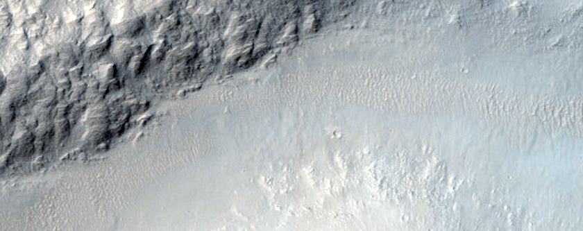 Massif Intersected by Mare-Type Ridge and Superposed by Sinuous Ridges