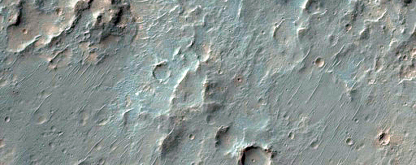 Light-Toned Deposits Along Coprates Catena Floor