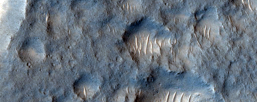 Topographic Low with Thermally-Distinct Terrain in THEMIS IR Images