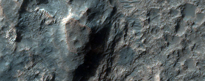 Layered Pits Northeast of Hellas Planitia