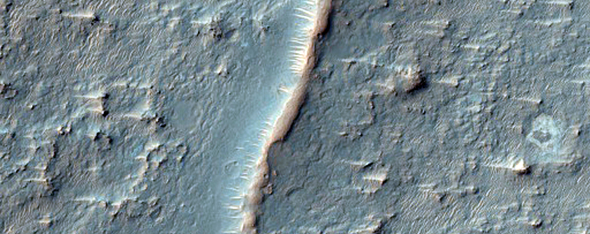 Ridges on Floor of Crater East of Huygens Crater