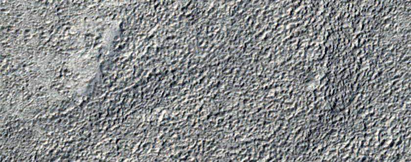 Channels along Edge of Northern Mid-Latitude Ejecta
