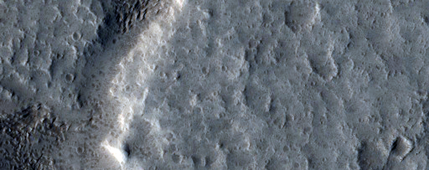 Channels near Trough in Tantalus Fossae