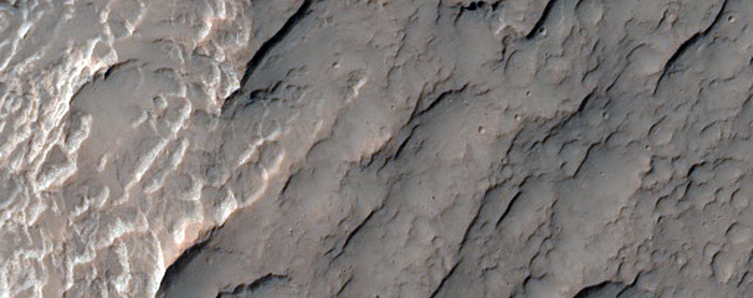 Layers in Light-Toned Materials within Southern Mid-Latitude Crater