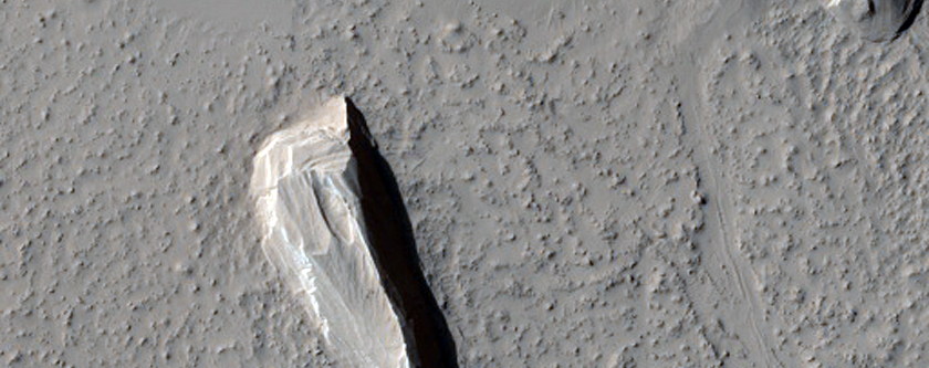 Yardangs and Crater in Amazonis Planitia