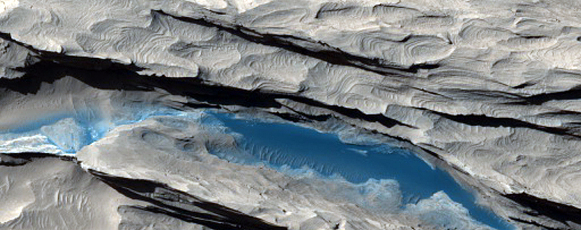 Dark Sediments in the Medusae Fossae Formation