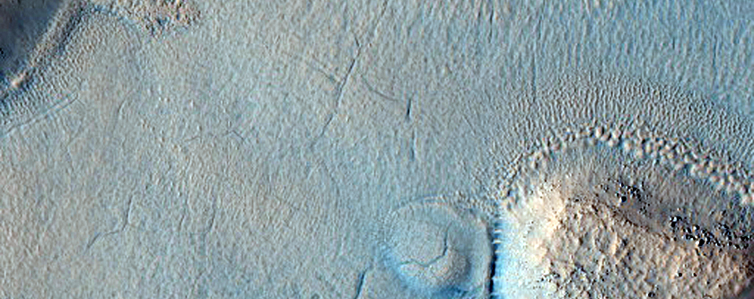 Mounds at Edge of Crater Ejecta