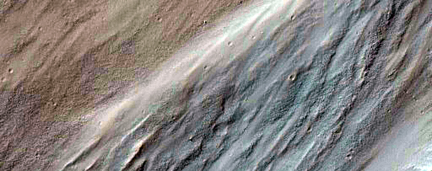 Light-Toned Deposits along Coprates Catena Floor