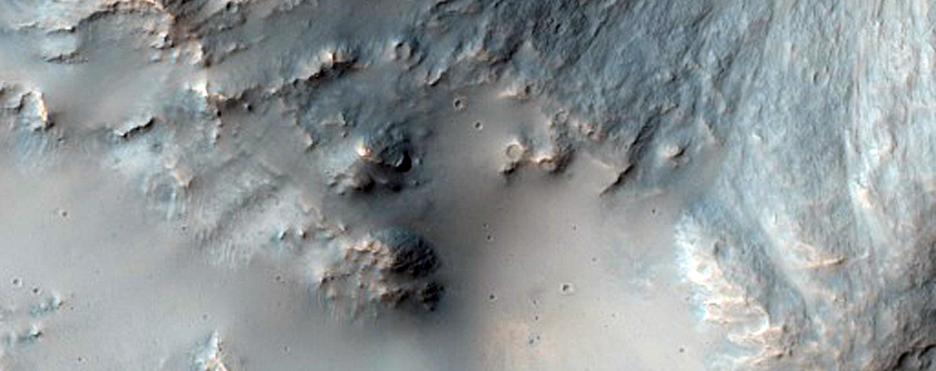 Well-Preserved Rocky 6-Kilometer Crater on Rim of Larger Crater