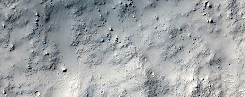 Fresh 1-Kilometer Impact Crater on Filled Floor of Much Larger Crater