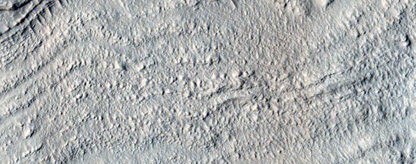 Circulära mönster efter en nedslagskrater i nordöstra Arabia Terra