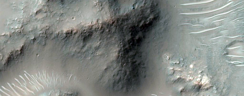 Bedrock Exposed by Impact Crater