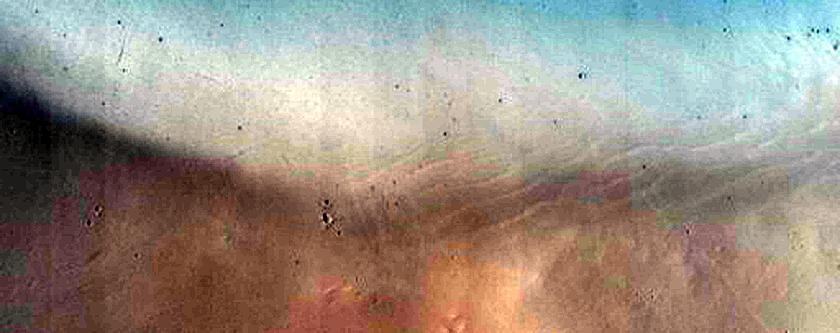Dark Material Deposit in Crater in Western Arabia Terra