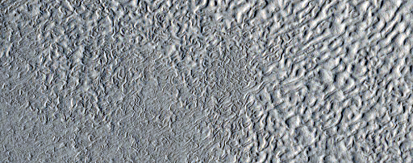 Banded Terrain around Knobs and Crater in Protonilus Mensae