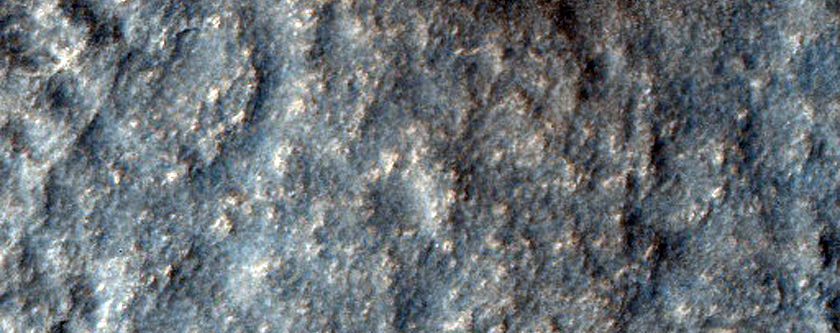 Curved Channel in Lyot Crater