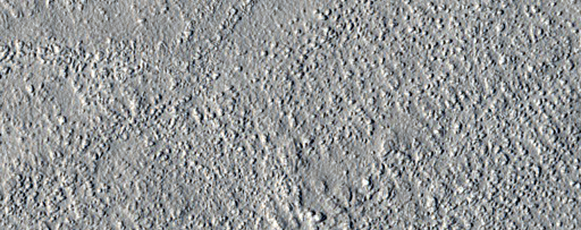 Mantled Terrain in Phlegra and Diacria Regions