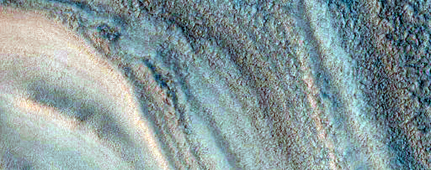 Crater Rim Emerging From North Polar Layered Deposits