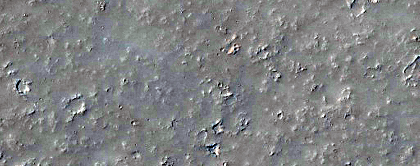 Chains of Pits on Southwest Edge of Tharsis Region