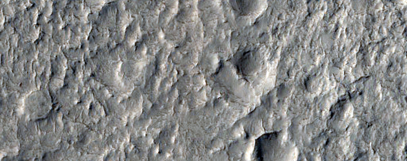 Light-Toned Layered Material in Northwest Schiaparelli Crater