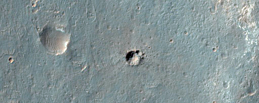 Intersection of Craters along Rim of Vinogradov Crater