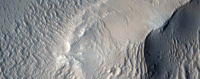 Valleys Cut across Northern Lycus Sulci