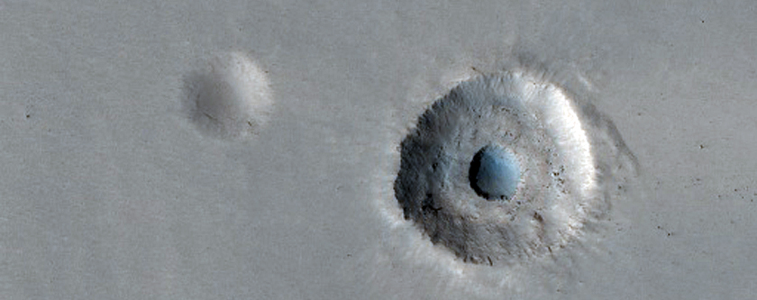 Terraced Crater on Larger Crater Ejecta in CTX Image