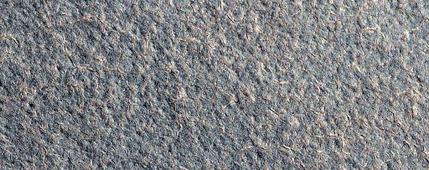 Degraded Crater with Asymmetric Ejecta