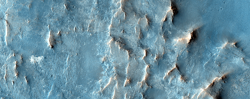 Possible Quartz-Rich Terrain in Antoniadi Crater