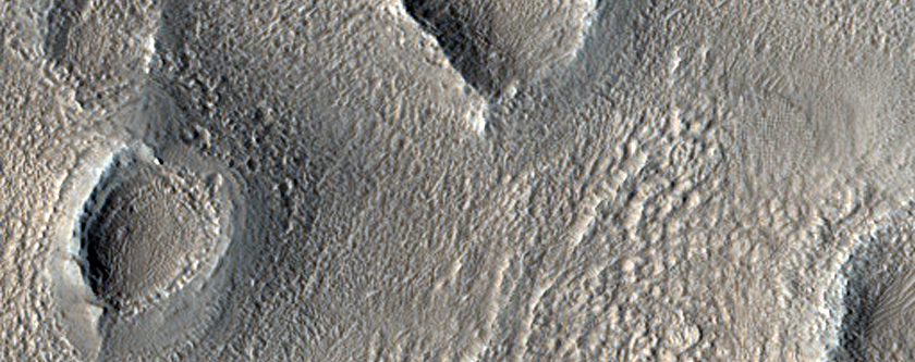 Flows and Valleys in Northern Lycus Sulci