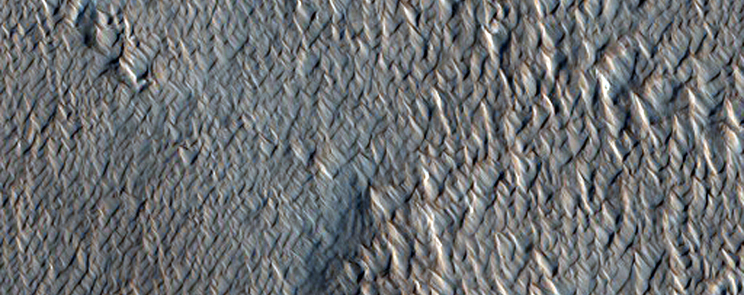 Mesa Scarp and Ridged Layered Material