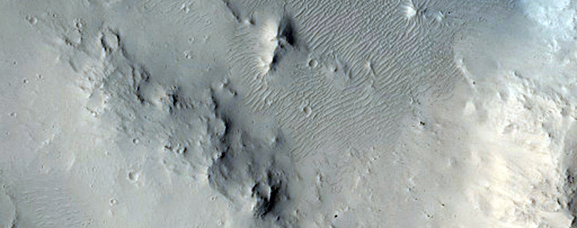 Layering in Crater Walls in Tartarus Colles