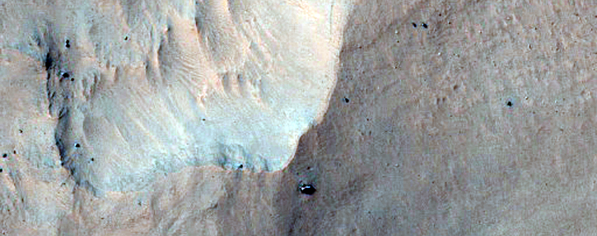 Excellent Bedrock Exposures in Crater on North Rim of Hellas Basin