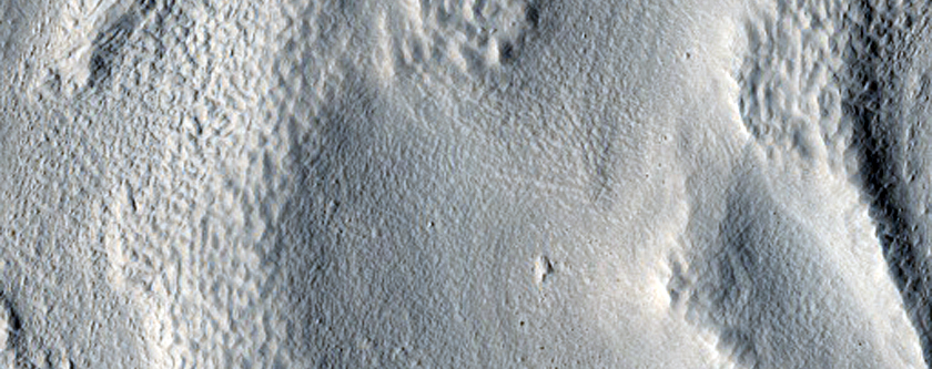 Central Mound and Arcuate Ridges in Mid-Latitude Crater