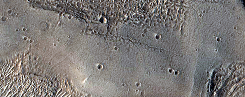 Flows and Valleys in Northern Lycus Sulci Terrain