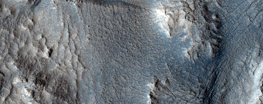 Boundary between Mesa Wasting and Crater Ejecta